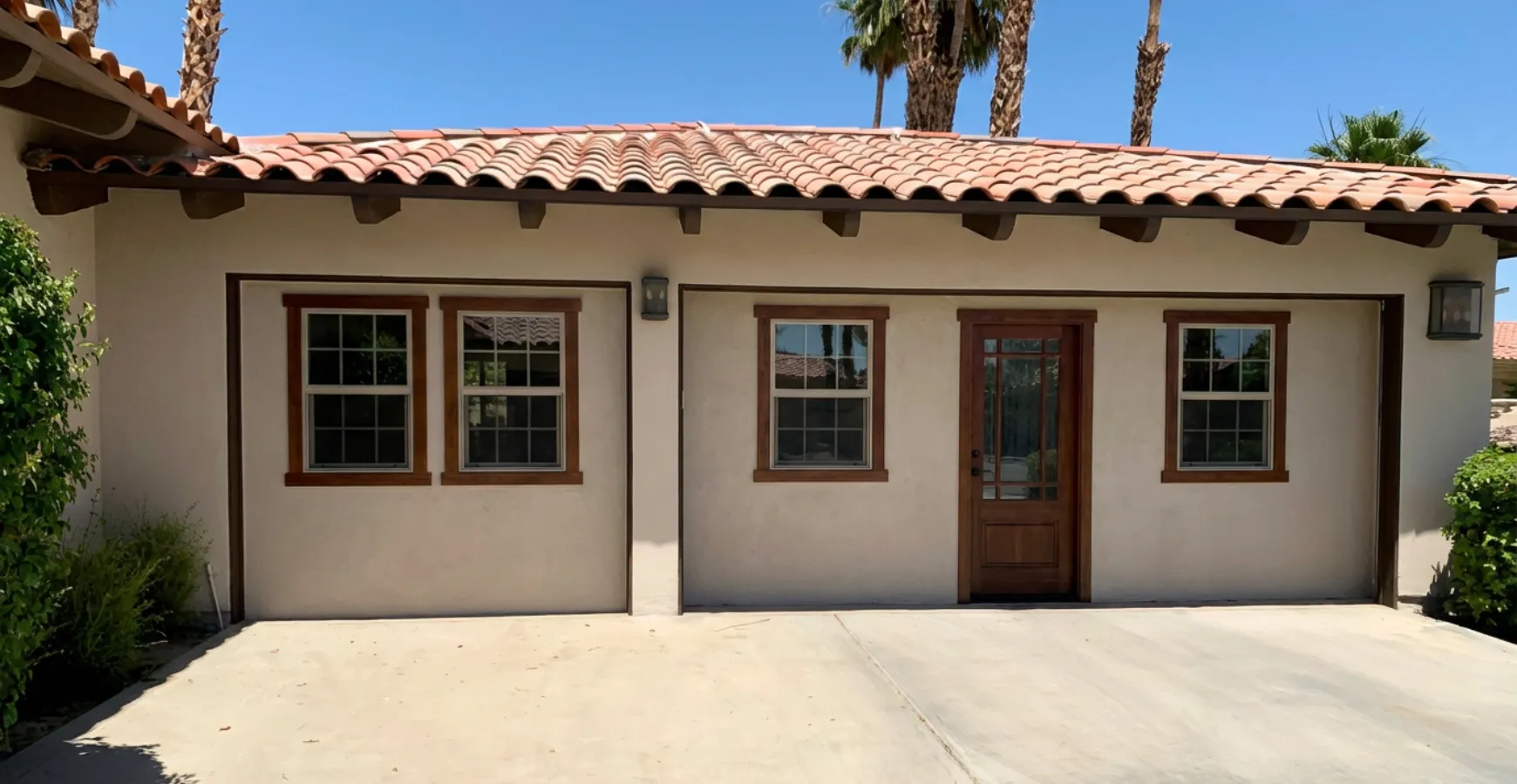 Garage converted into ADU in Los Angeles featuring windows front door and finished residential exterior
